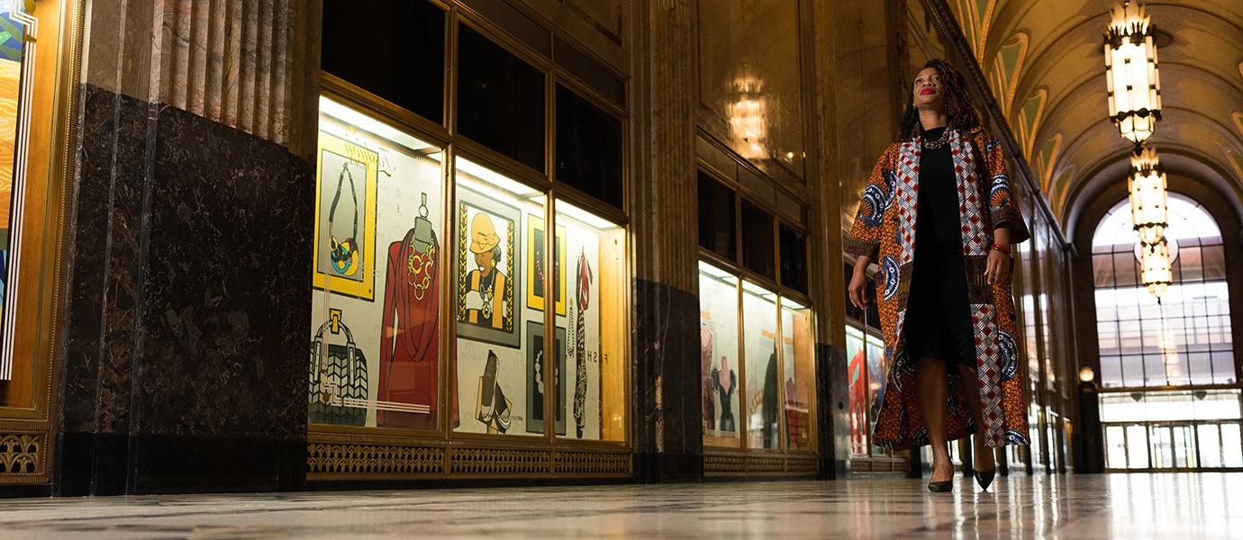 Woman walking through hallway