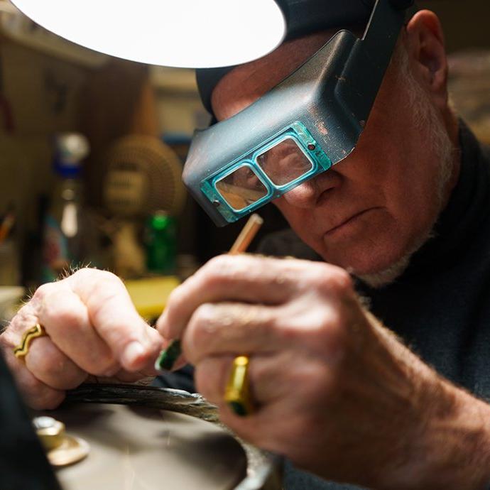 A man working on jewelry